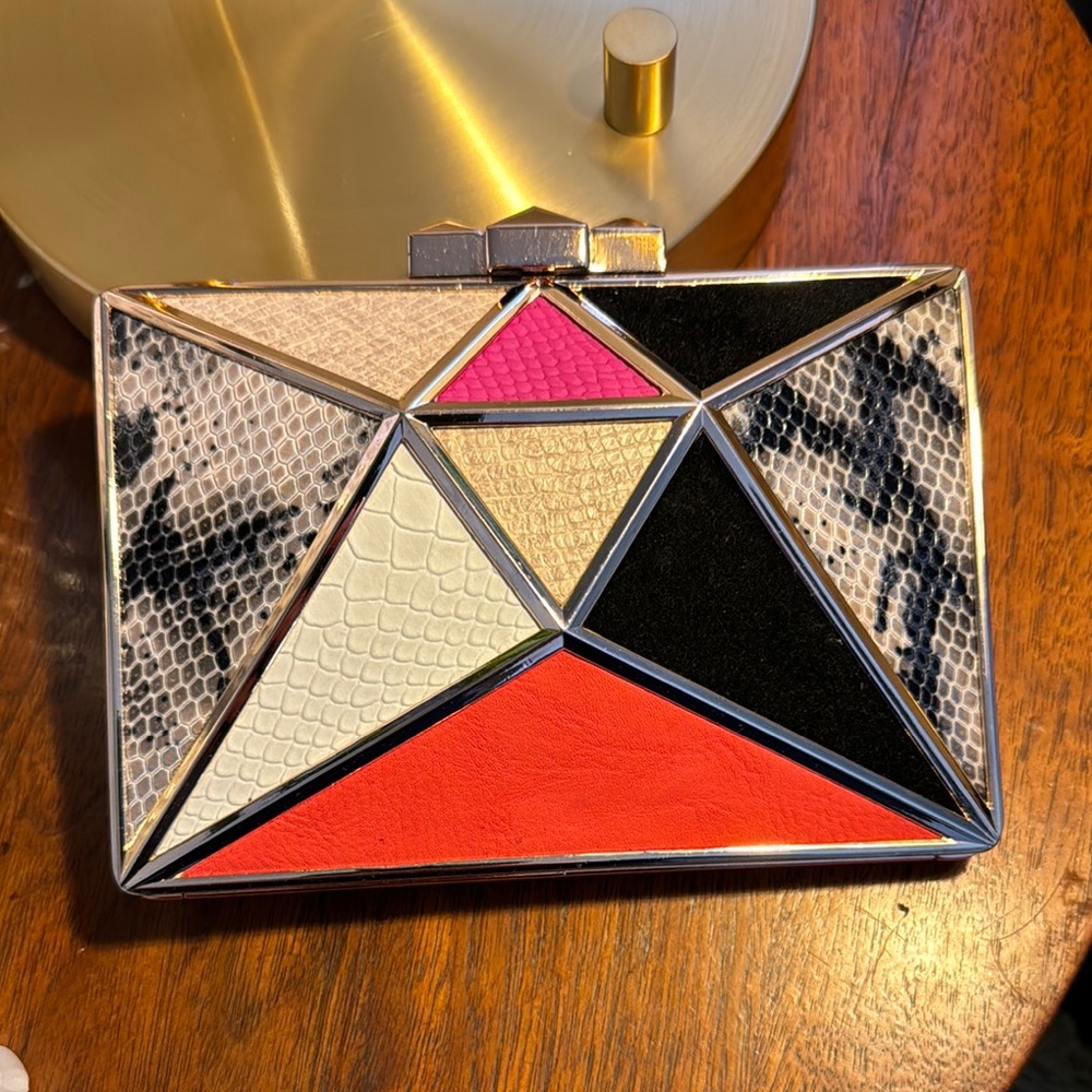 Caché Geometric Multicolor Clutch with Studded Closure